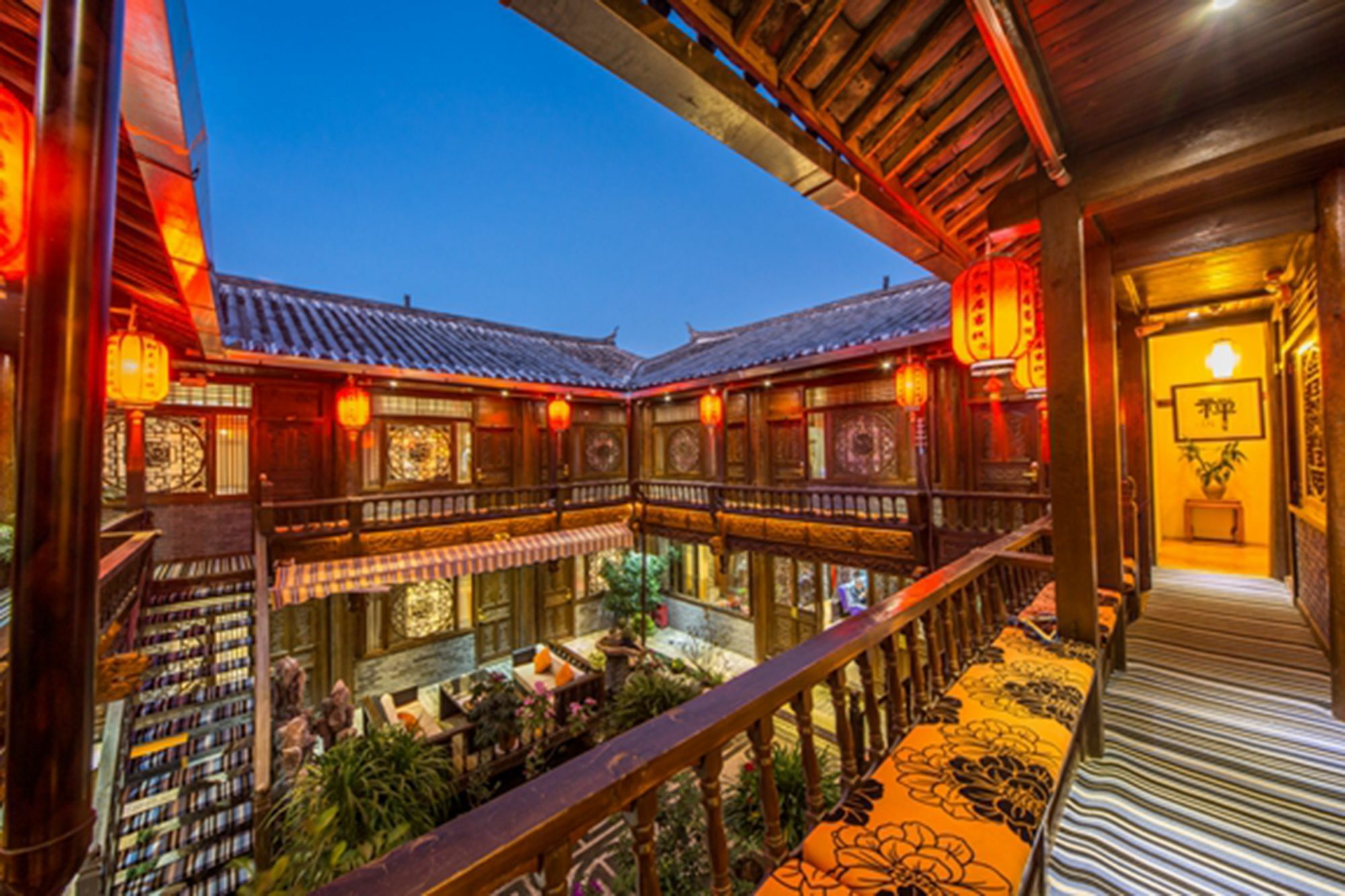 He Mu Ju Inn Zhongyi Branch Licsiang Kültér fotó